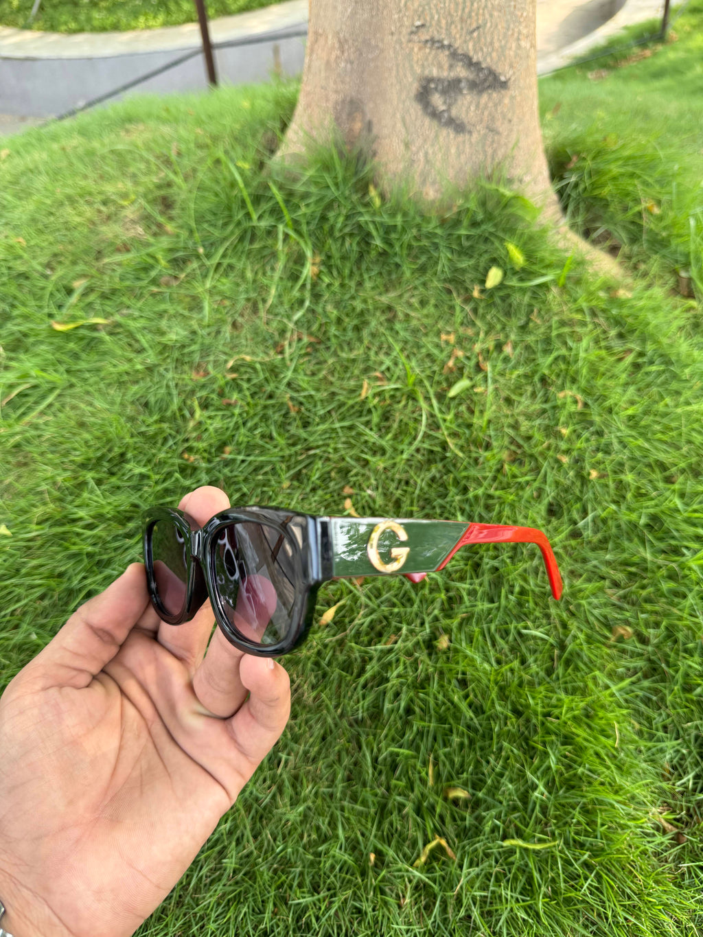 Gucci Black Rectangular Sunglasses with Gold G Logo & Green-Red Accents